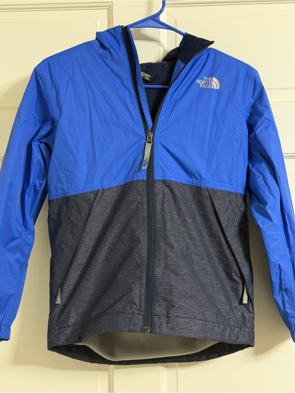 The North Face Blue and Heather Navy Kids' Hooded jacket water proof